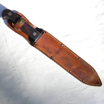 Rare American WW2 era Royal Brand Cutlery Co. fighting knife, original GI-signed leather scabbard; excellent - Image 2