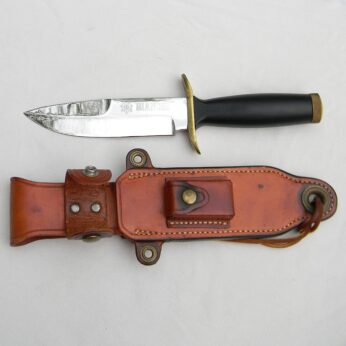 Bianchi Solingen Germany 855 Nighthawk survival knife with hollow handle, orig leather sheath, honing stone. Scarce type in rare UNUSED condition.